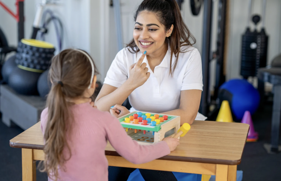 therapist engaging in skill acquisition